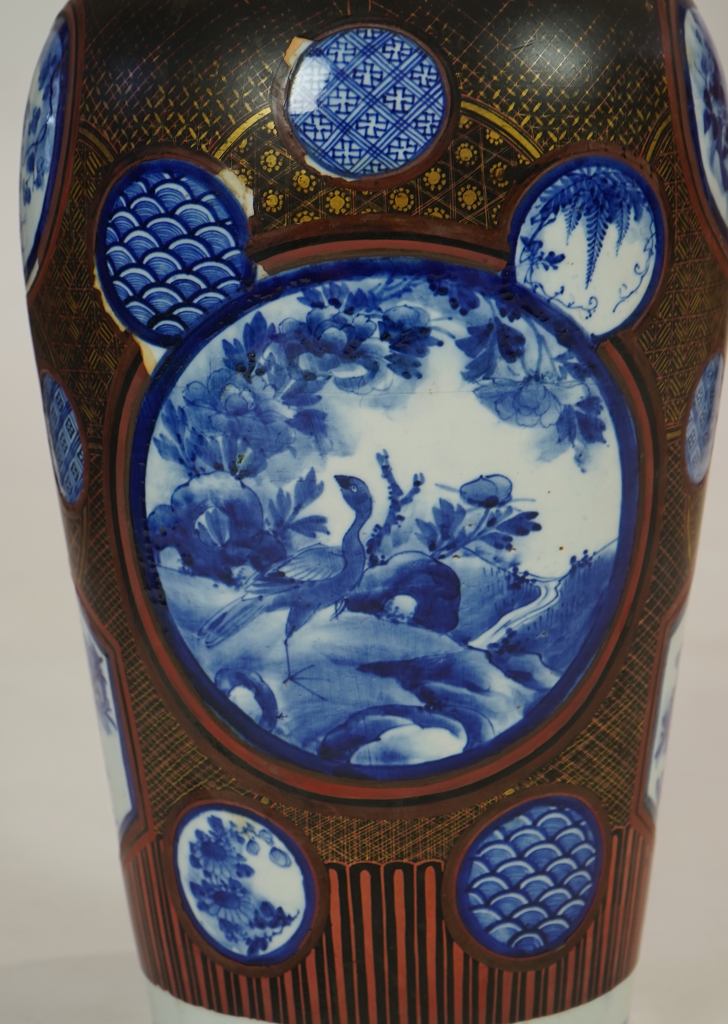 A large Japanese blue and white and gilt lacquered vase, late 19th century